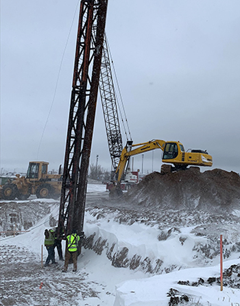 Photo: Crews drive pile during Hwy 29 construction.